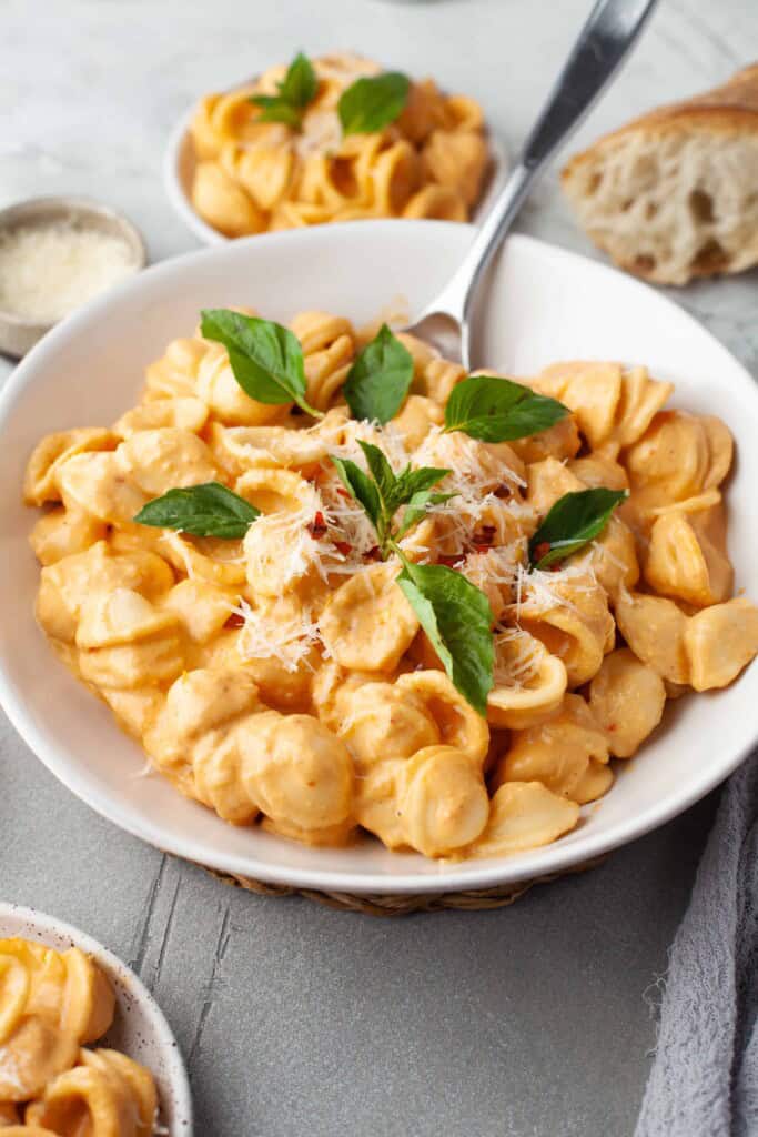 Overhead view of pasta with vodka sauce.