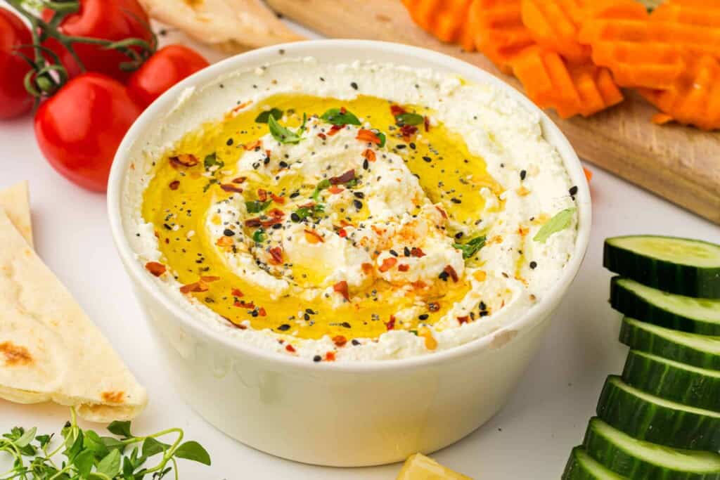 Overhead view of feta dip in a bowl.