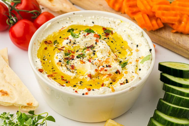 Overhead view of feta dip in a bowl.
