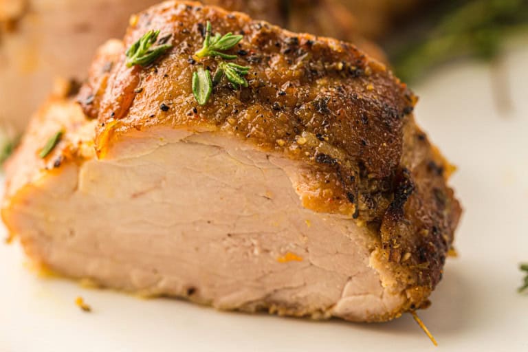 Headon view of sliced pork tenderloin.