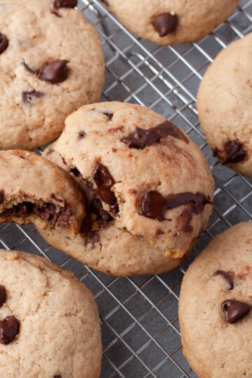 overhead view of nutella stuffed cookies on a wire baking rack.