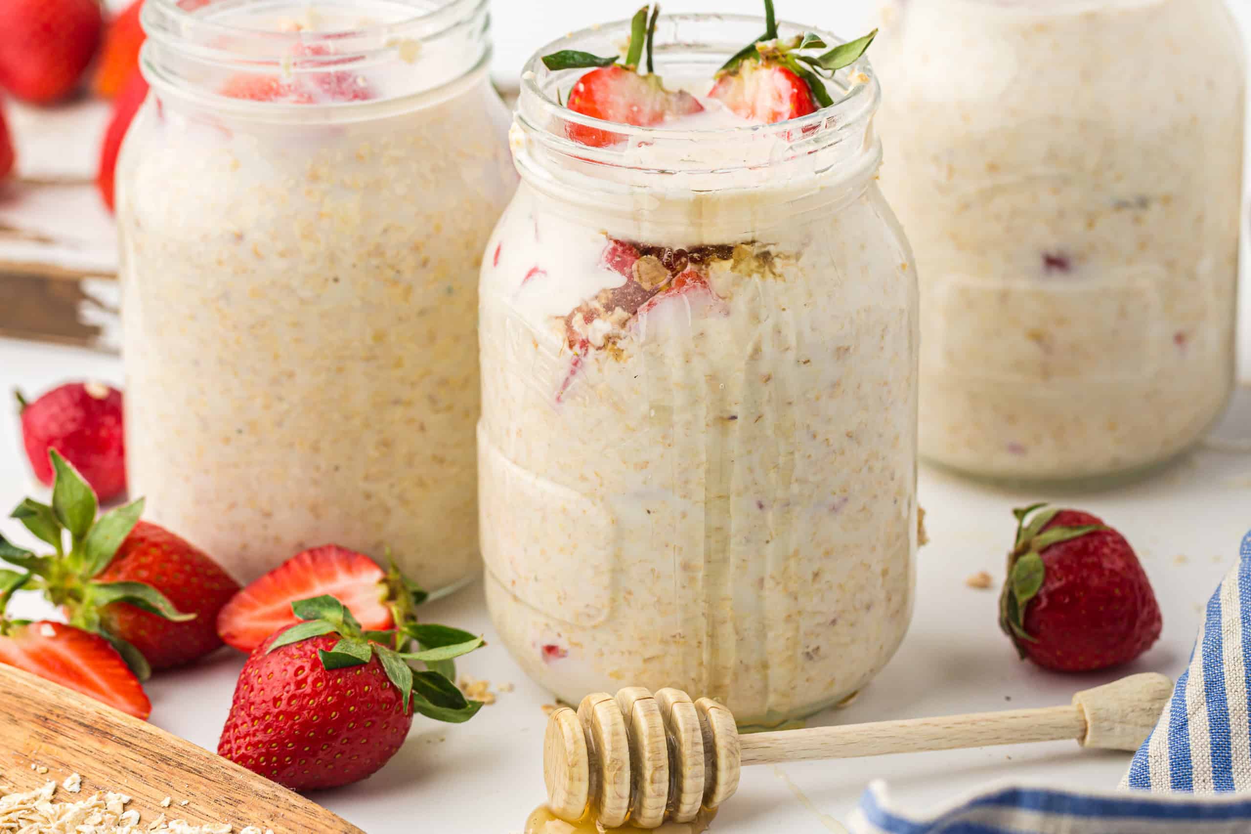 Headon view of strawberry overnight oats in Mason jars.