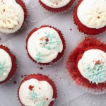 Overhead view of cupcakes with chocolate snowflakes.