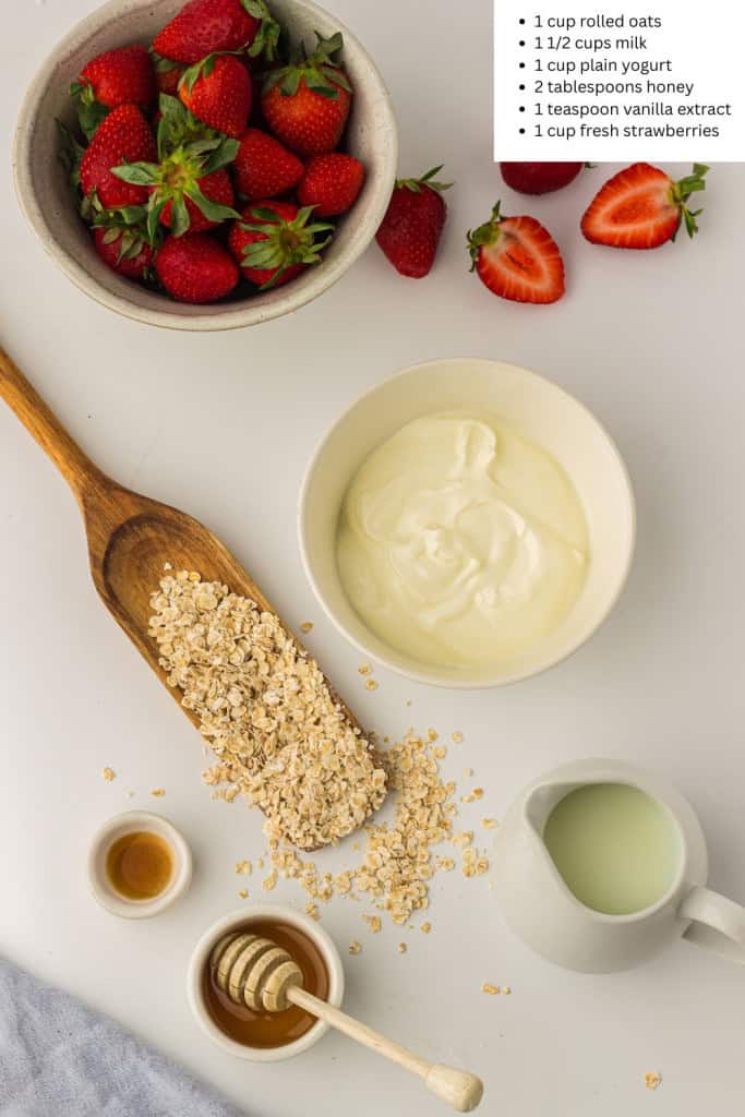 Overhead view of ingredients for strawberry overnight oats.