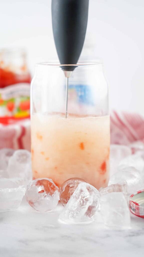 Frothing jam seltzer.