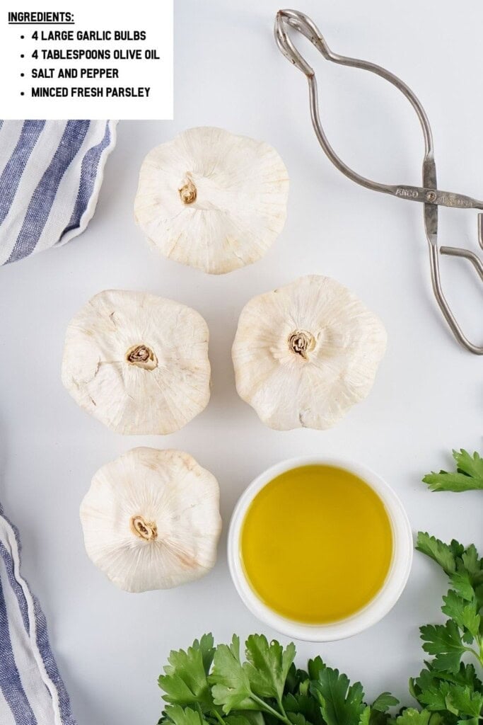 Overhead view of air fryer roasted garlic ingredients.