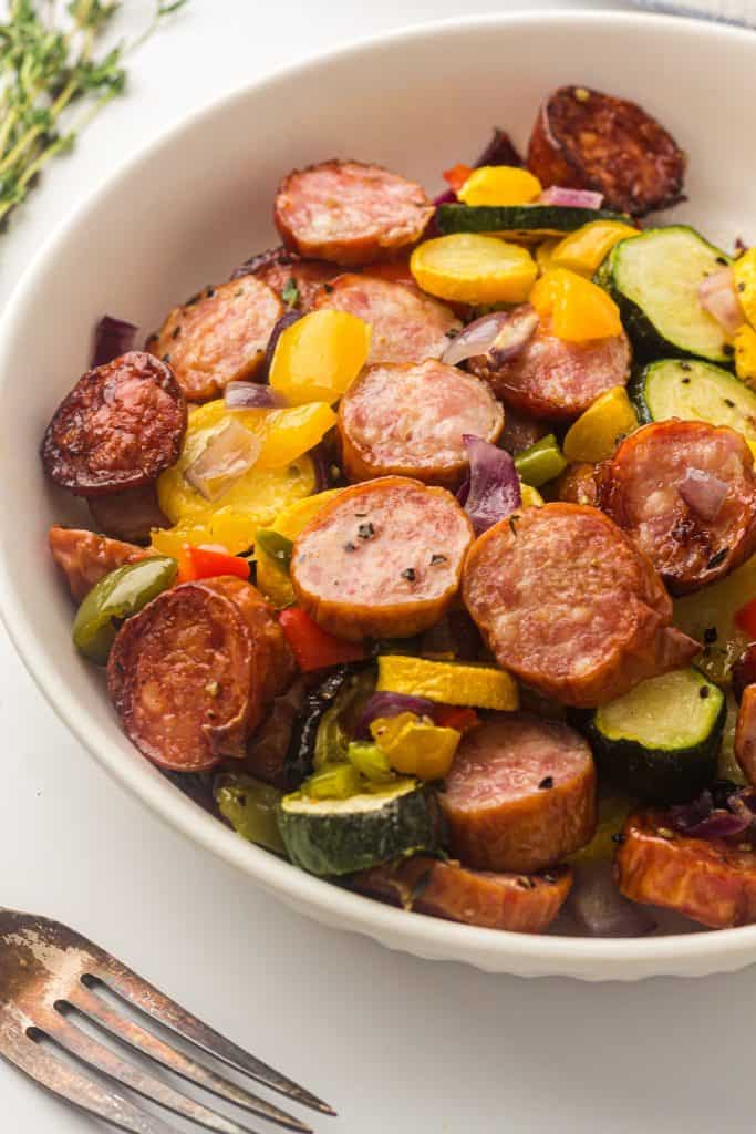 Bowl of kielbasa and vegetables.