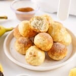 Air Fryer Banana Donut Holes on a white plate.