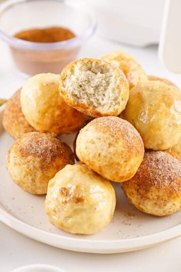 Air Fryer Banana Donut Holes on a white plate.