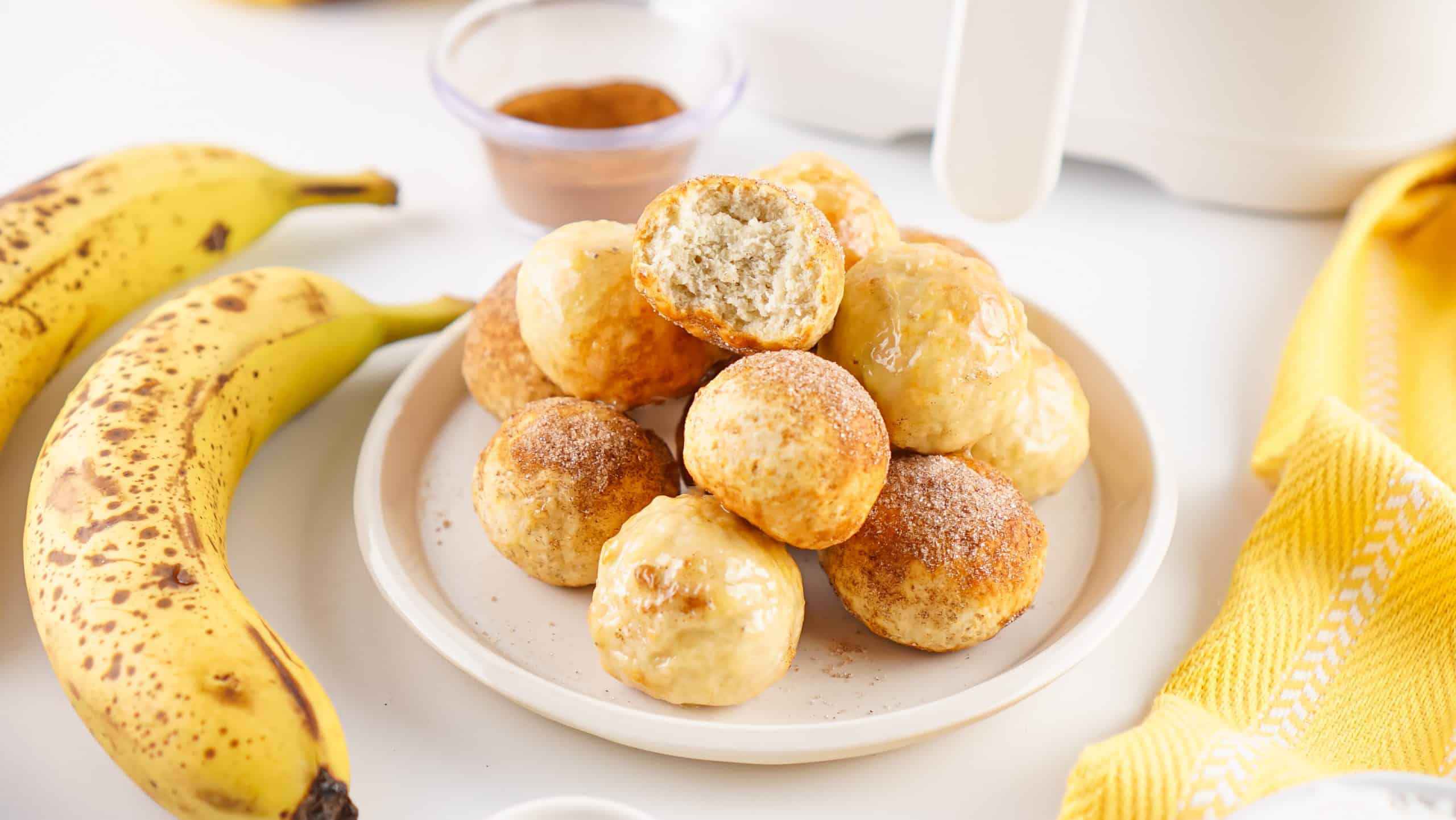 Air Fryer Banana Donut Holes on a white plate.