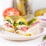 pickle sandwich cut in half.