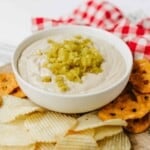 Bowl of Pot Roast Dip with chips and pretzels.