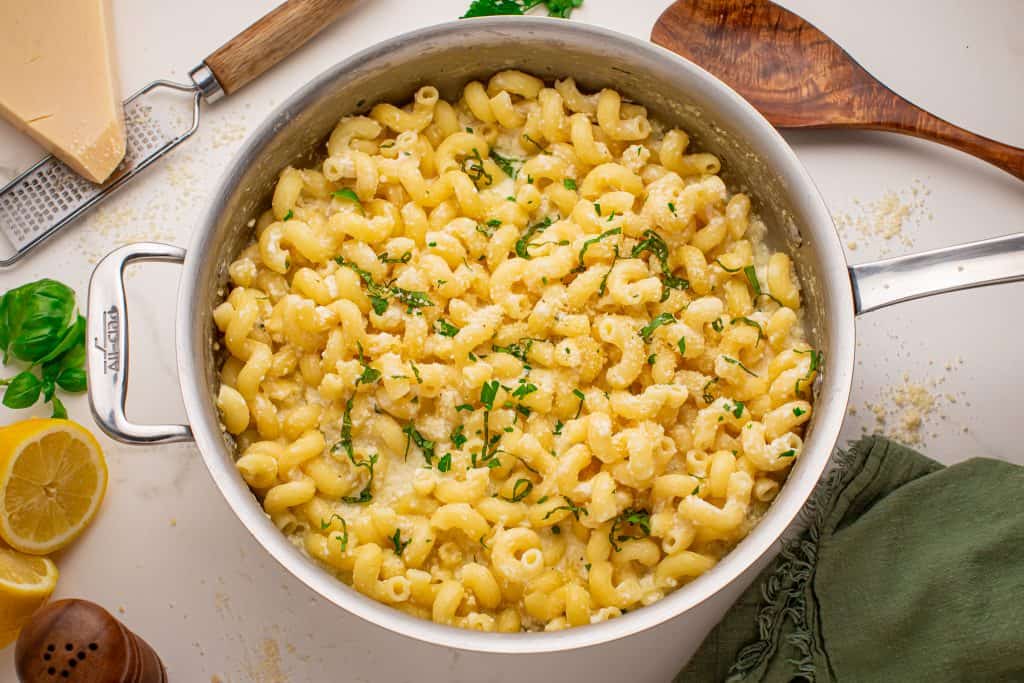 Overhead view of Greek yogurt pasta with lemon sauce in a pan.