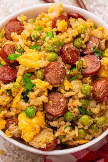Overhead view of Hot Dog Fried Rice in a white bowl.