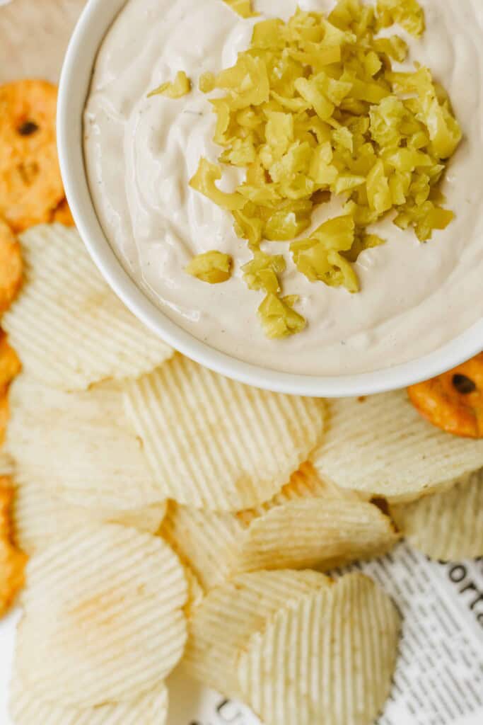 Overhead view of Pot Roast Dip with diced pepperoncinis on top.