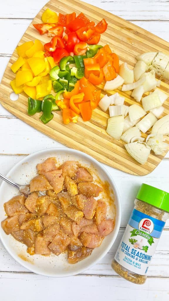Overhead view of grilled chicken kabob ingredients prepped.