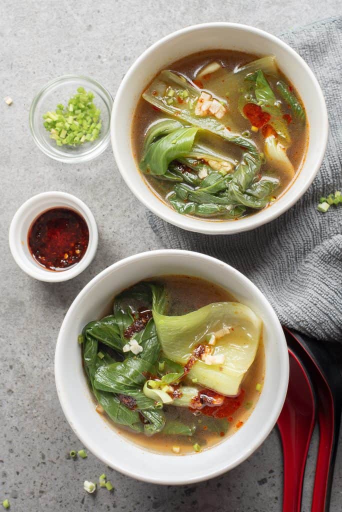 Overhead view of two bowls of Bok Choy Soup.