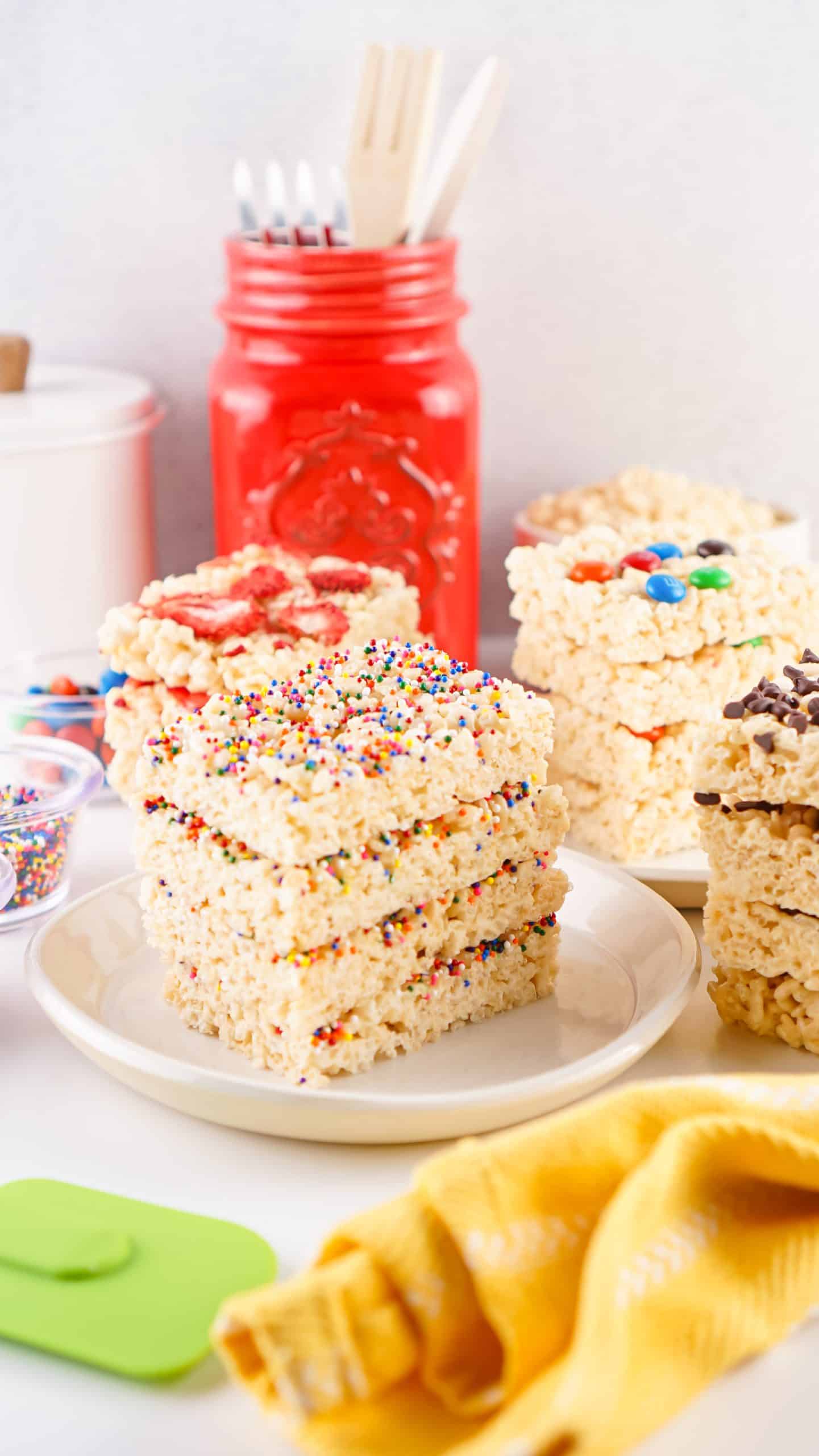 Sheet Pan Rice Krispies Treats with different toppings.