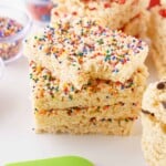 Head-on photo of Rice Krispies Treats bars with multi-coloredcsprinkles on them