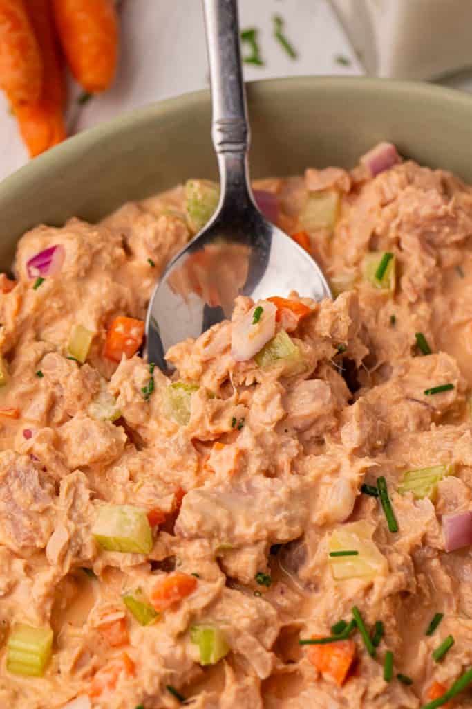Spoon in Buffalo tuna salad dip.