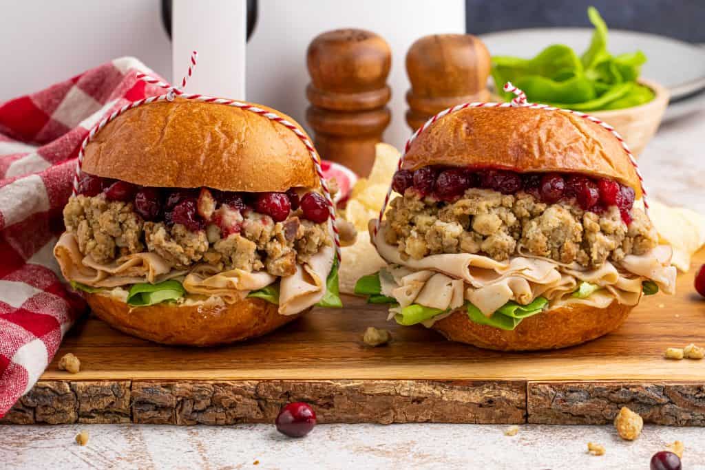 Headon photo of leftover Turkey Sandwiches on Brioche buns.