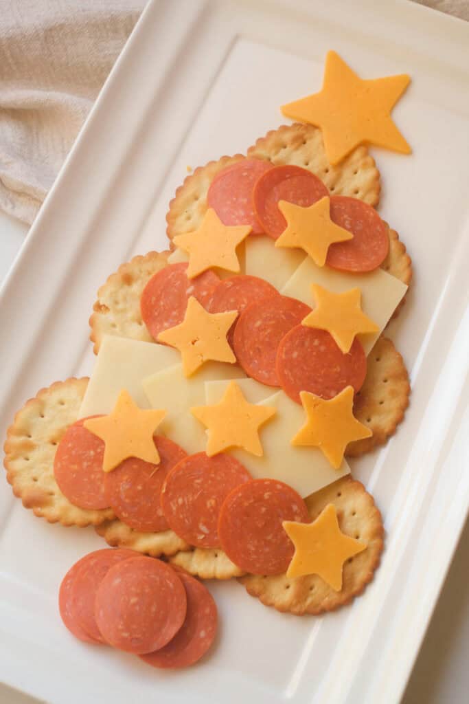 Overhead view of Cracker tree with cheese and pepperoni.