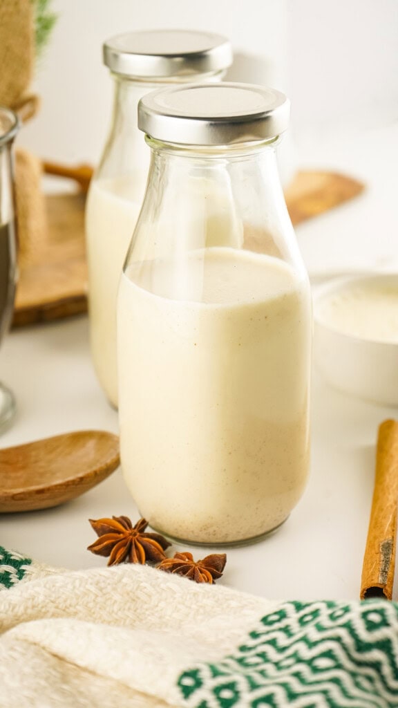 Eggnog coffee creamer in a glass bottle.