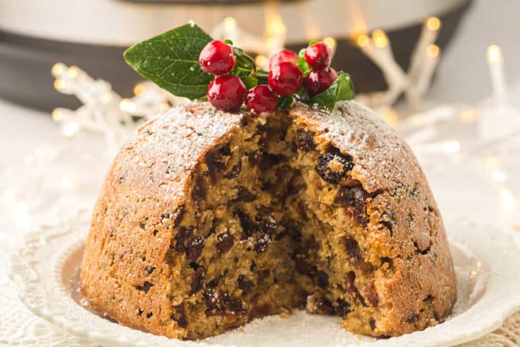 Christmas pudding with cranberries on top.