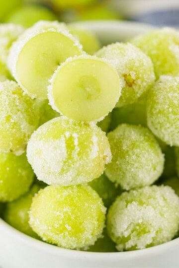 Green grapes in a white bowl.