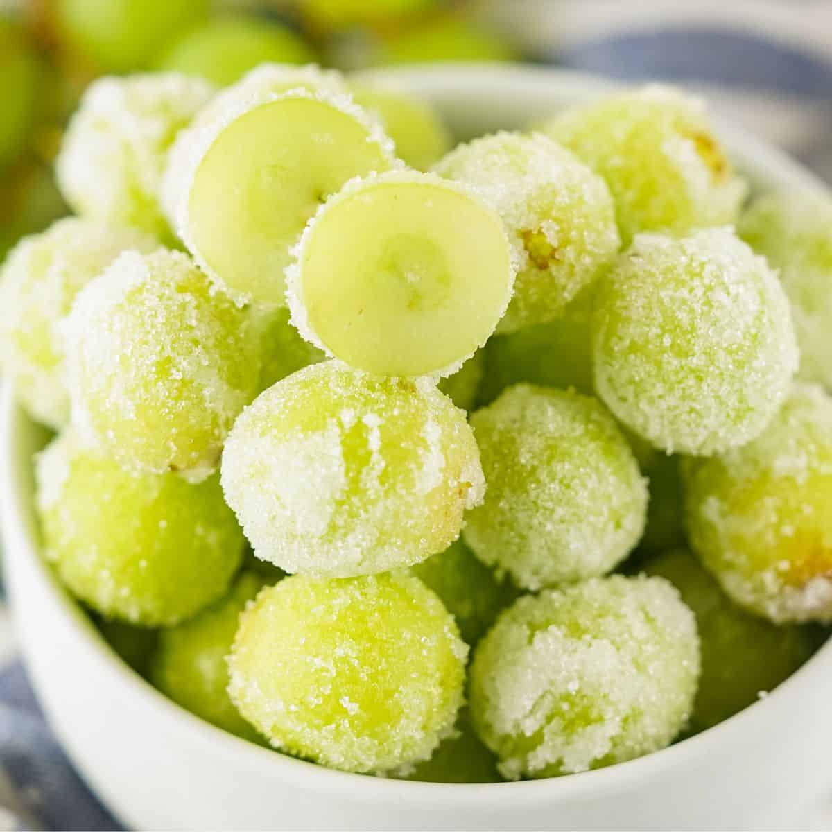 Green grapes in a white bowl.