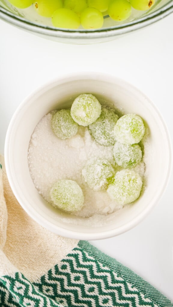 Overhead view of sugar coating grapes.