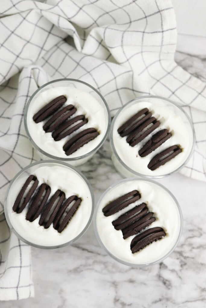 Overhead view of Oreo cookies pressed into Greek yogurt.