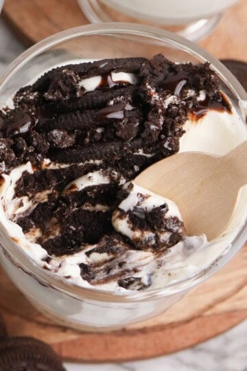 Spoon in cheesecake.