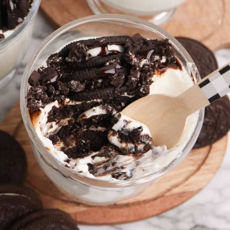 Spoon in cheesecake.