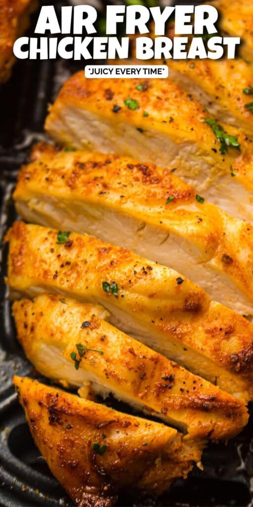 Air Fryer Chicken Breast sliced in an air fryer basket