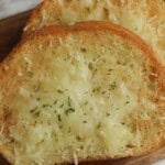 cheesy garlic bread in air fryer with melted Italian blend cheese