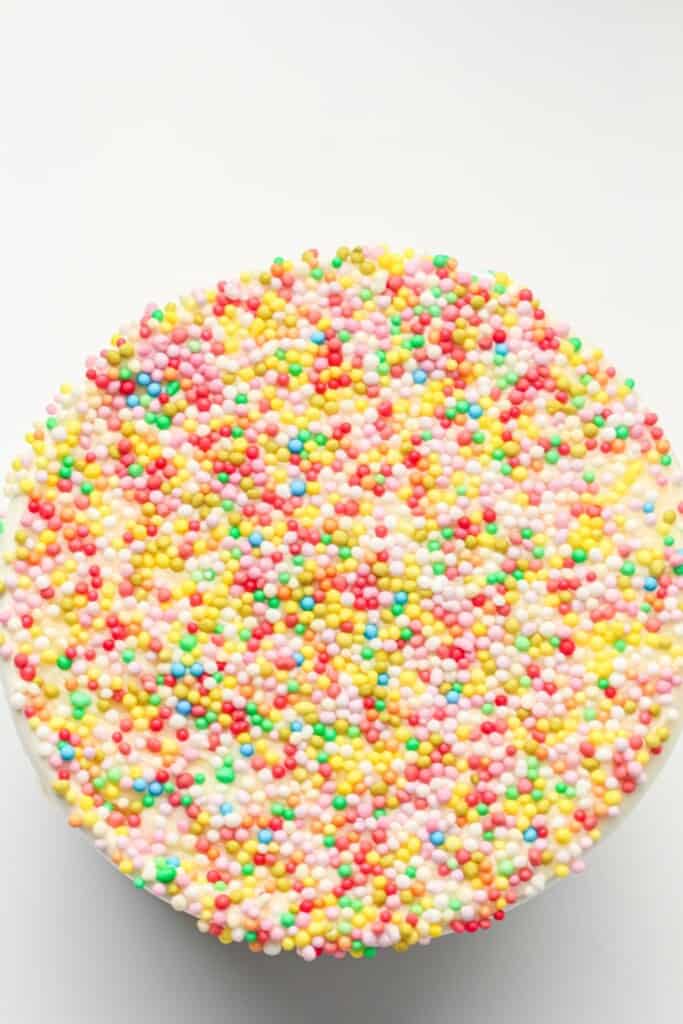 dot cake top covered with non-pareils