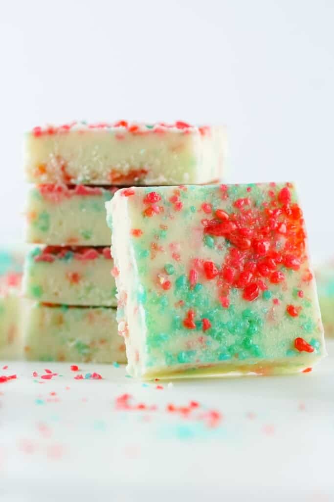 Squares of firecracker fudge topped with red and blue popping candy