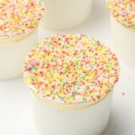 A viral dot cake in a gold-trimmed cup