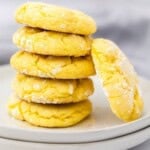 Stack of soft lemon crinkle cookies made with cake mix on a white plate