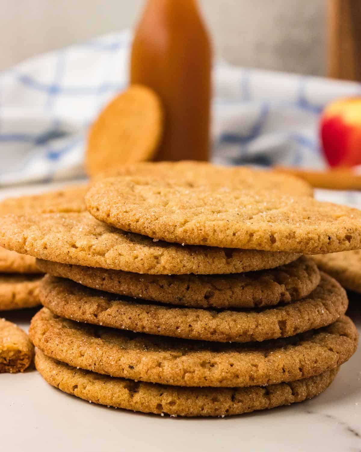 Apple cider snickerdoodles stacked on top of each other